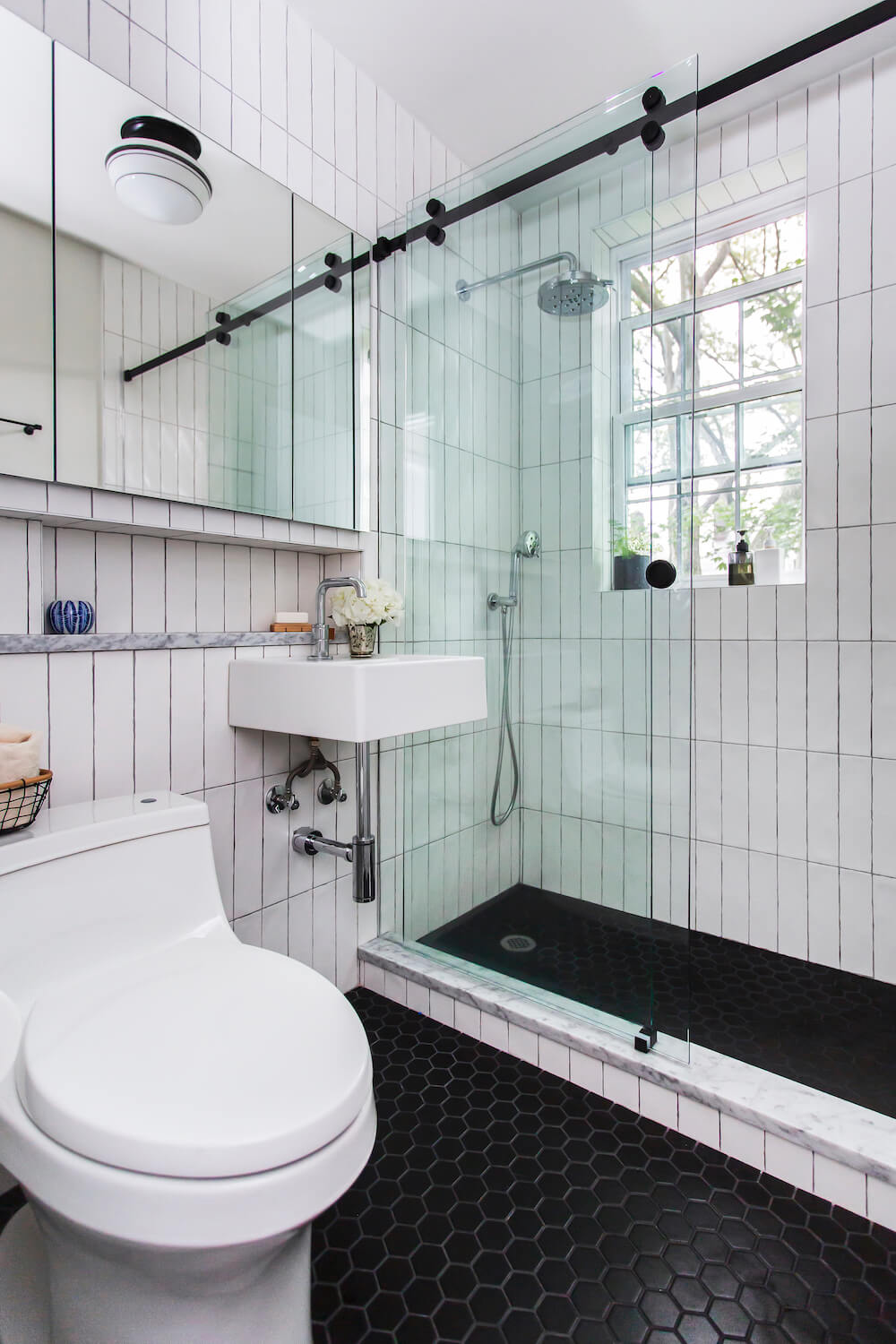 black hexagon bathroom floor tile, clear shower doors